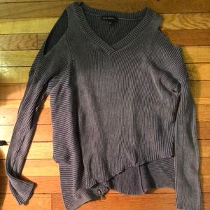 Asymmetrical sweater with shoulder cut-out